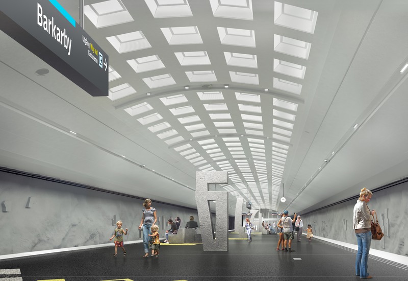 Stora granitblock möter besökarna på plattformen, att luta sig emot eller kanske sitta på. Den konstnärliga gestaltningen finns på alla delar av stationen.