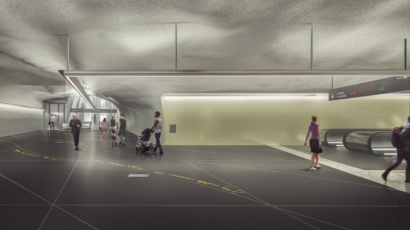 Visionsbild av Barkarbystadens station. Ett mellanplan med rulltrappor till höger och vänster.